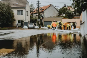 Neighborhood street affected by floodwater and property water damage